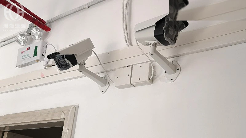 深圳光明凤凰城连锁门店监控安装,穿墙开孔怎么处理